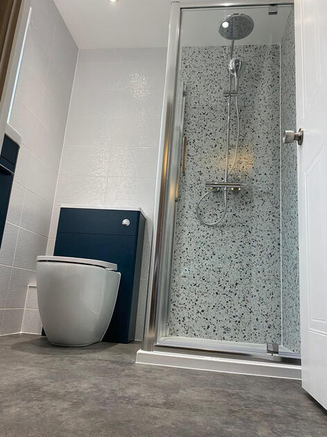 En-suite renovation Witney with lvt luxury vinyl tile flooring En-suite renovation with tiles and shower panelling witney