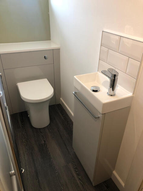 Cloakroom renovation with fitted furniture and metro tiles Aston Bampton witney